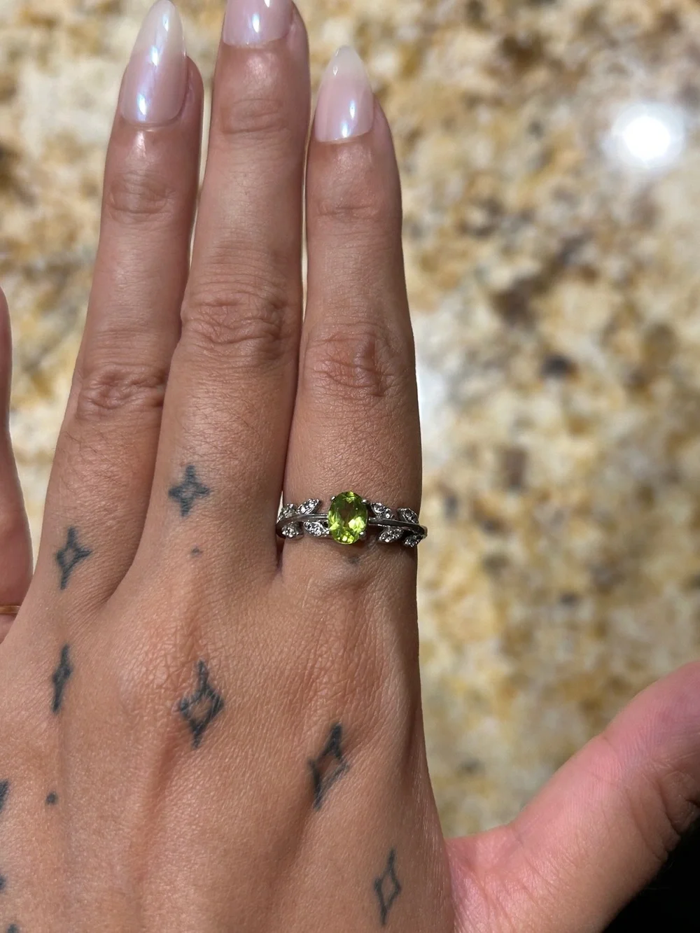 Sterling Silver Peridot Ring with Leaf Accent